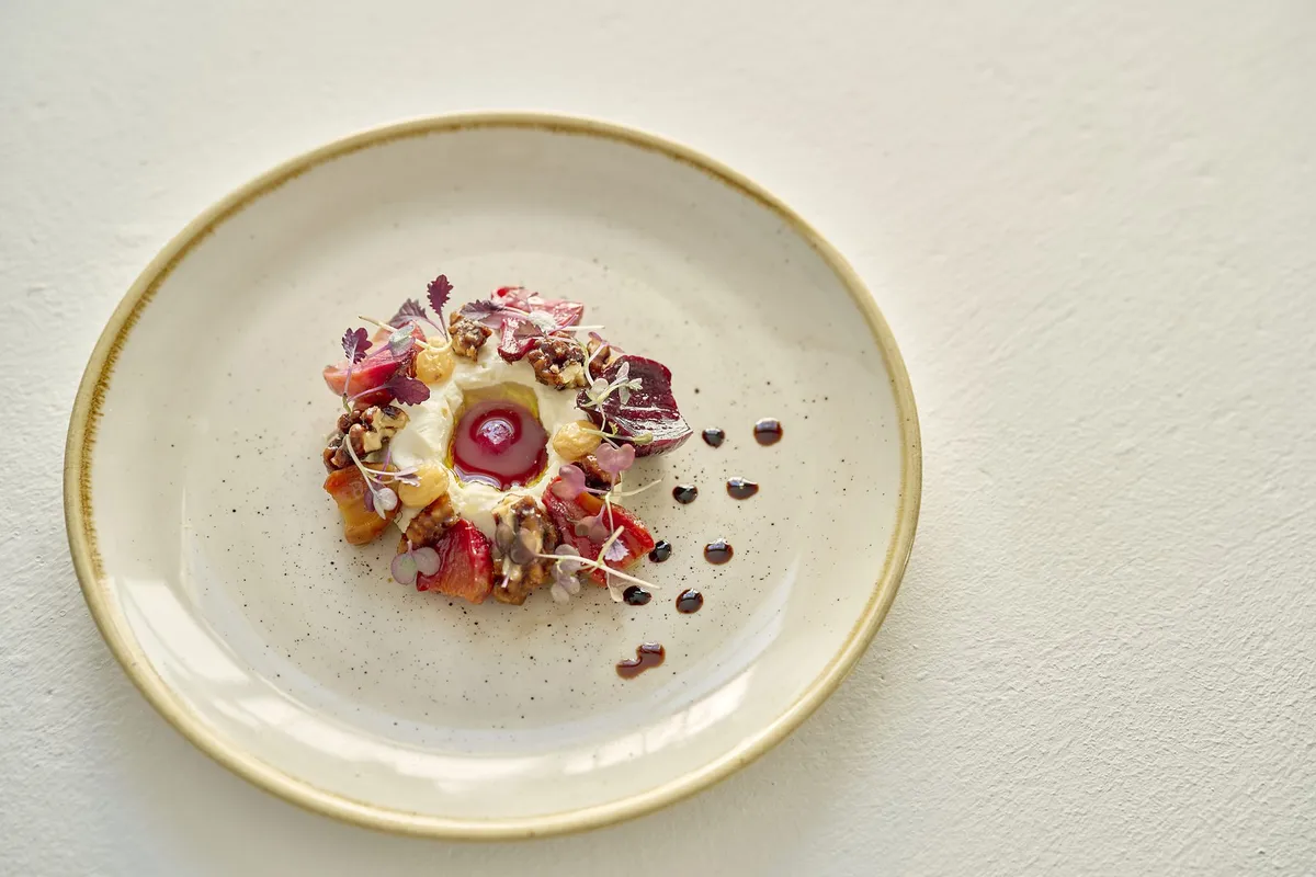 A Galley dessert plate with seasonal fruit and cream