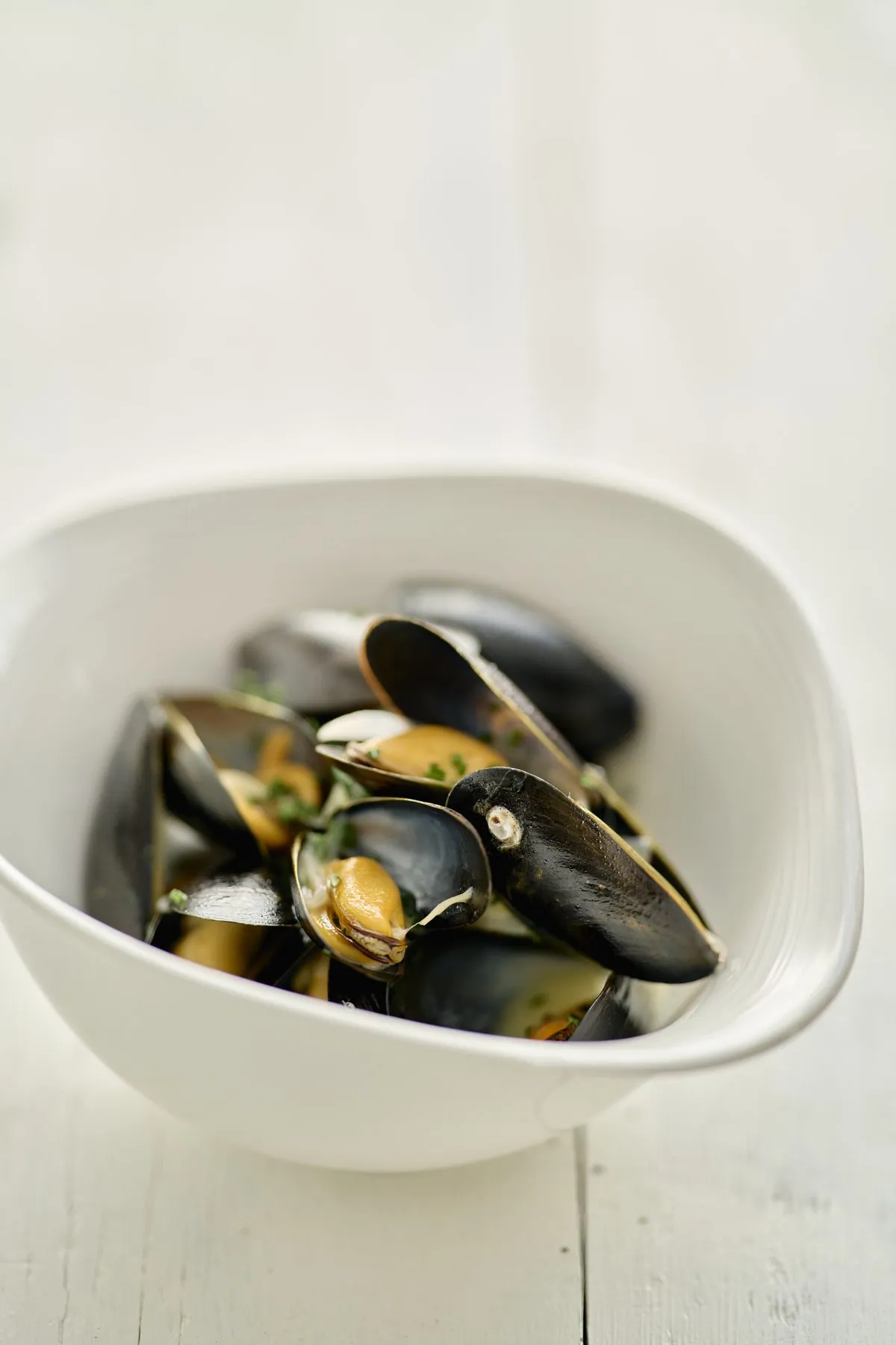 St Austell mussels in a white bowl, top-down